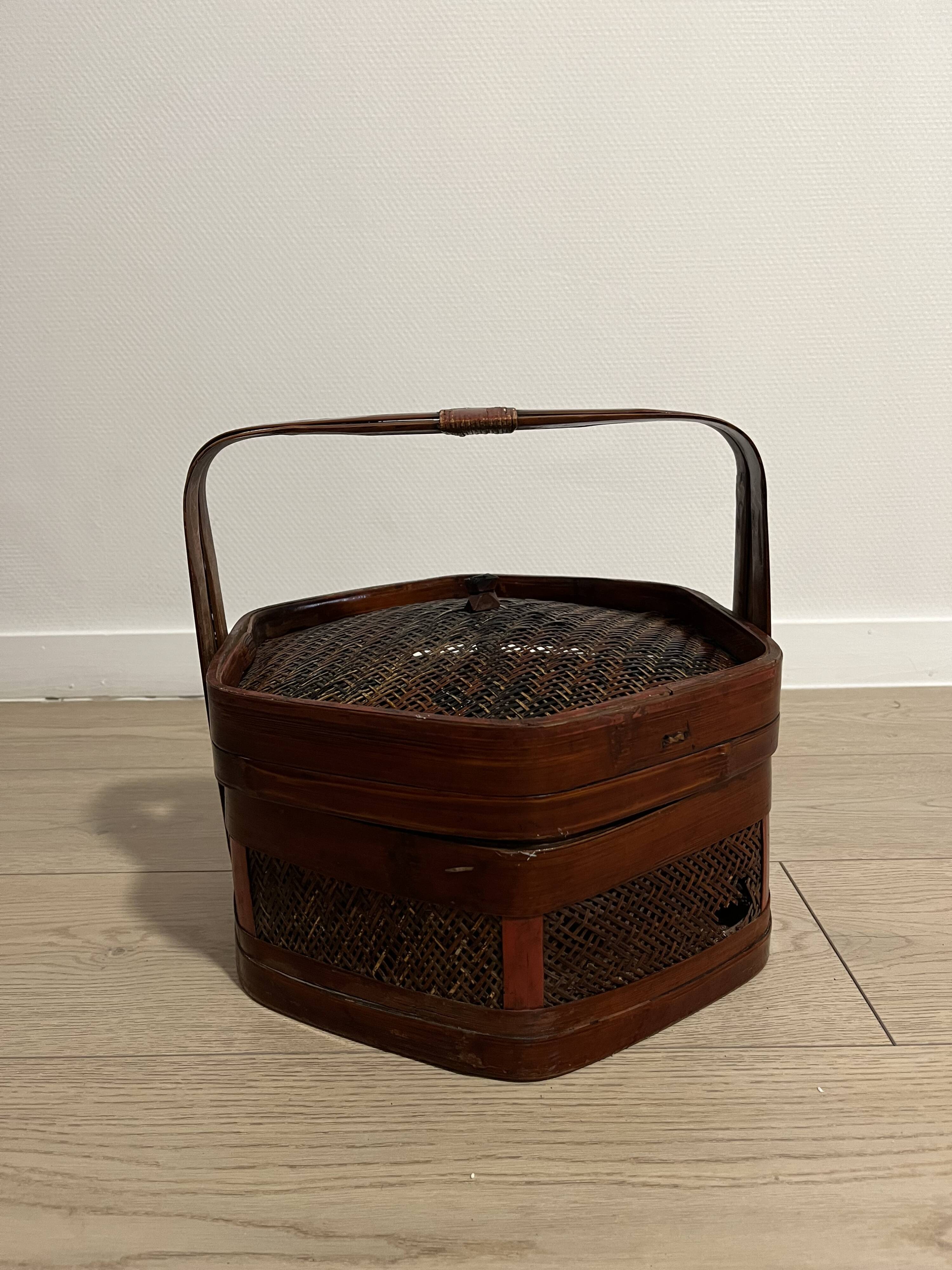 Ancient wooden and woven wicker basket,