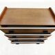 Vintage commode from the 1960s with tapered legs.