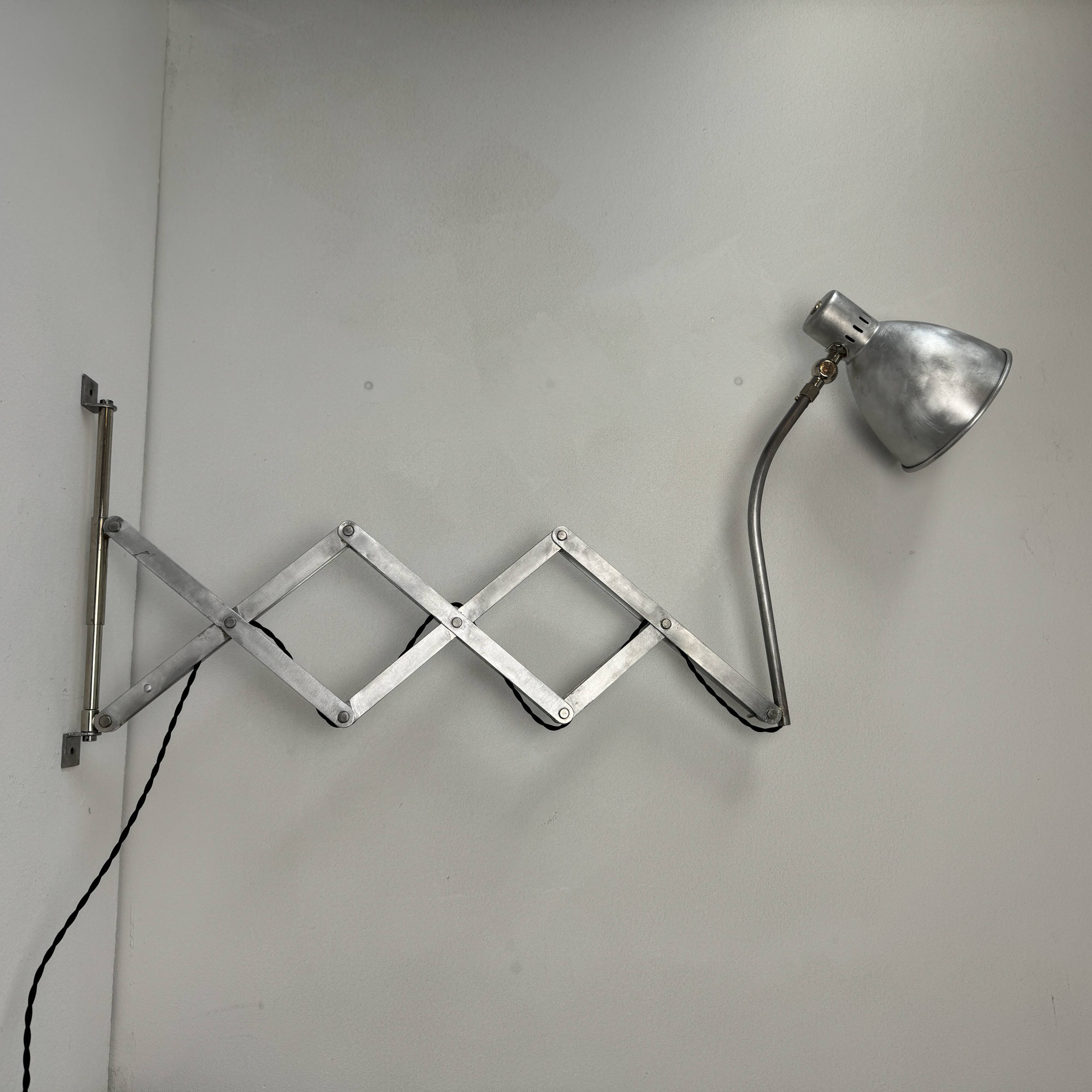 Antique large industrial accordion wall lamp