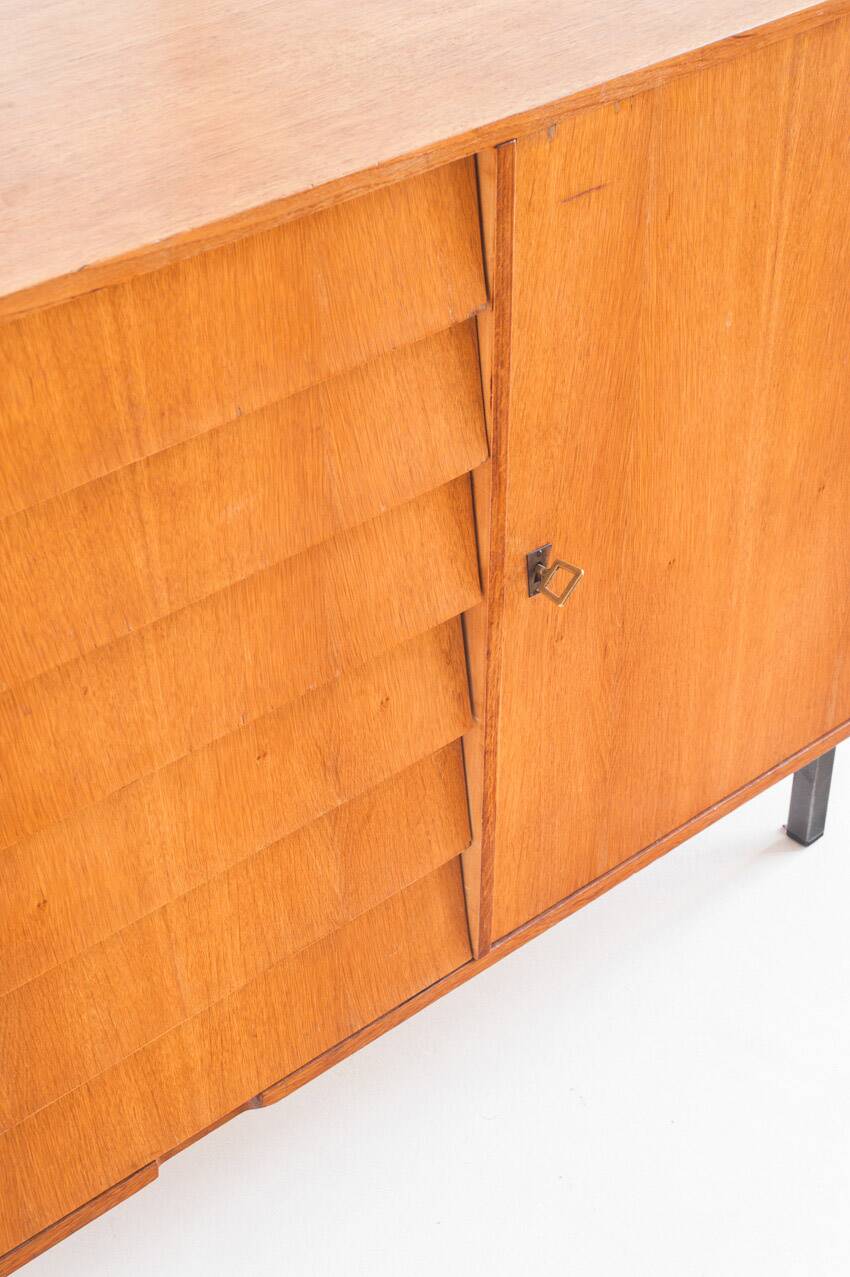 Vintage sideboard. Oak wood, drawers and door. France, 1960s