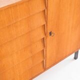 Vintage sideboard. Oak wood, drawers and door. France, 1960s