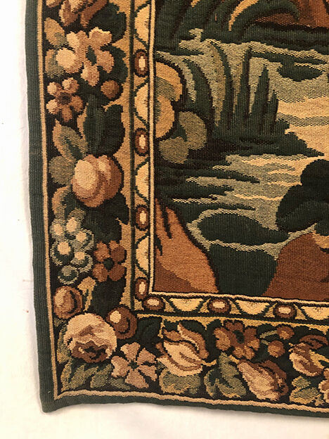 Tapestry decorated with a pink flamingo in a green landscape, woven by hand