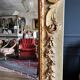 Italian mirror from the Napoleon III period in painted and gilded wood