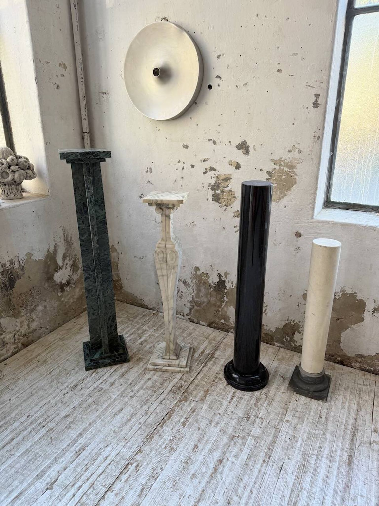 Set of 4 marble columns or pedestals.