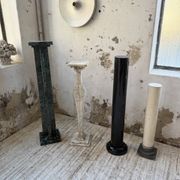 Set of 4 marble columns or pedestals.