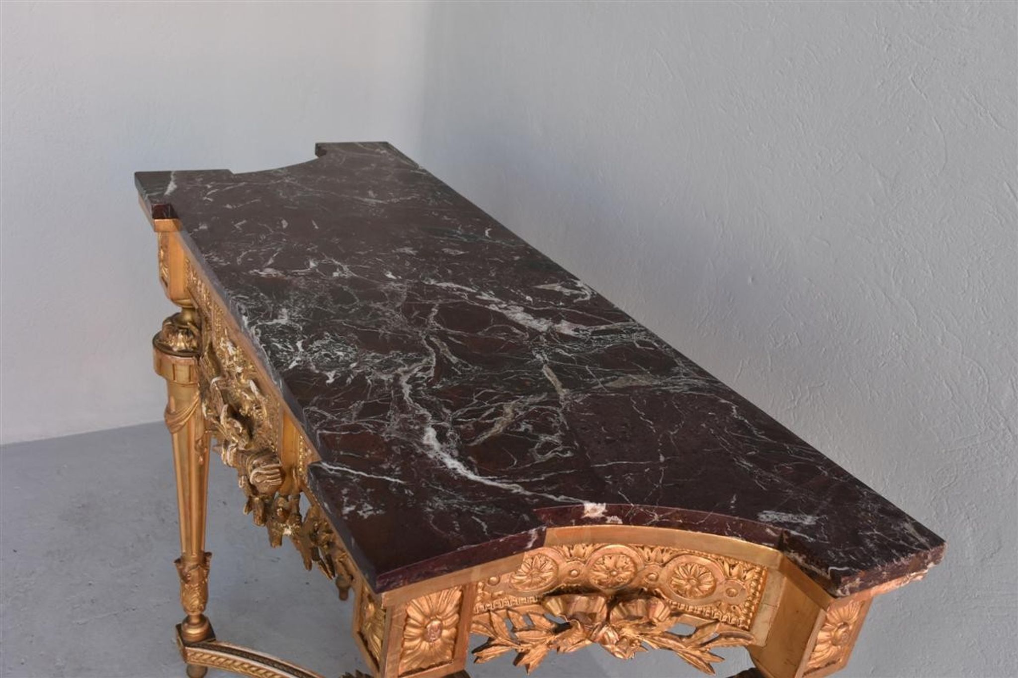 Console époque XIXème bois et stuc doré de style Louis XVI