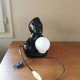 Vintage 80s lamp in the shape of a woman's bust made of black ceramic.