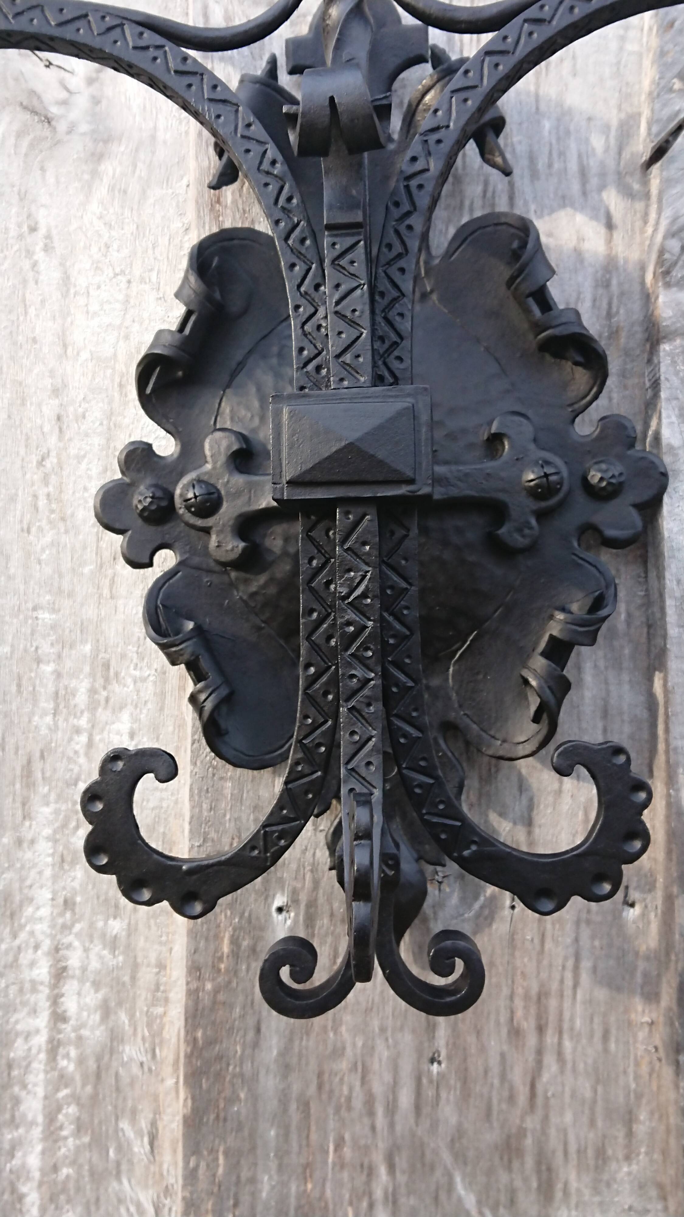 Pair of black wrought iron sconces - neo-Gothic style - from the 1950s