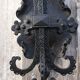 Pair of black wrought iron wall sconces - neo-Gothic style - from the 1950s