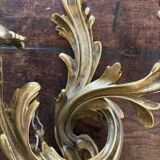 Pair of wall lights with Louis XV style gilded bronze bulbs