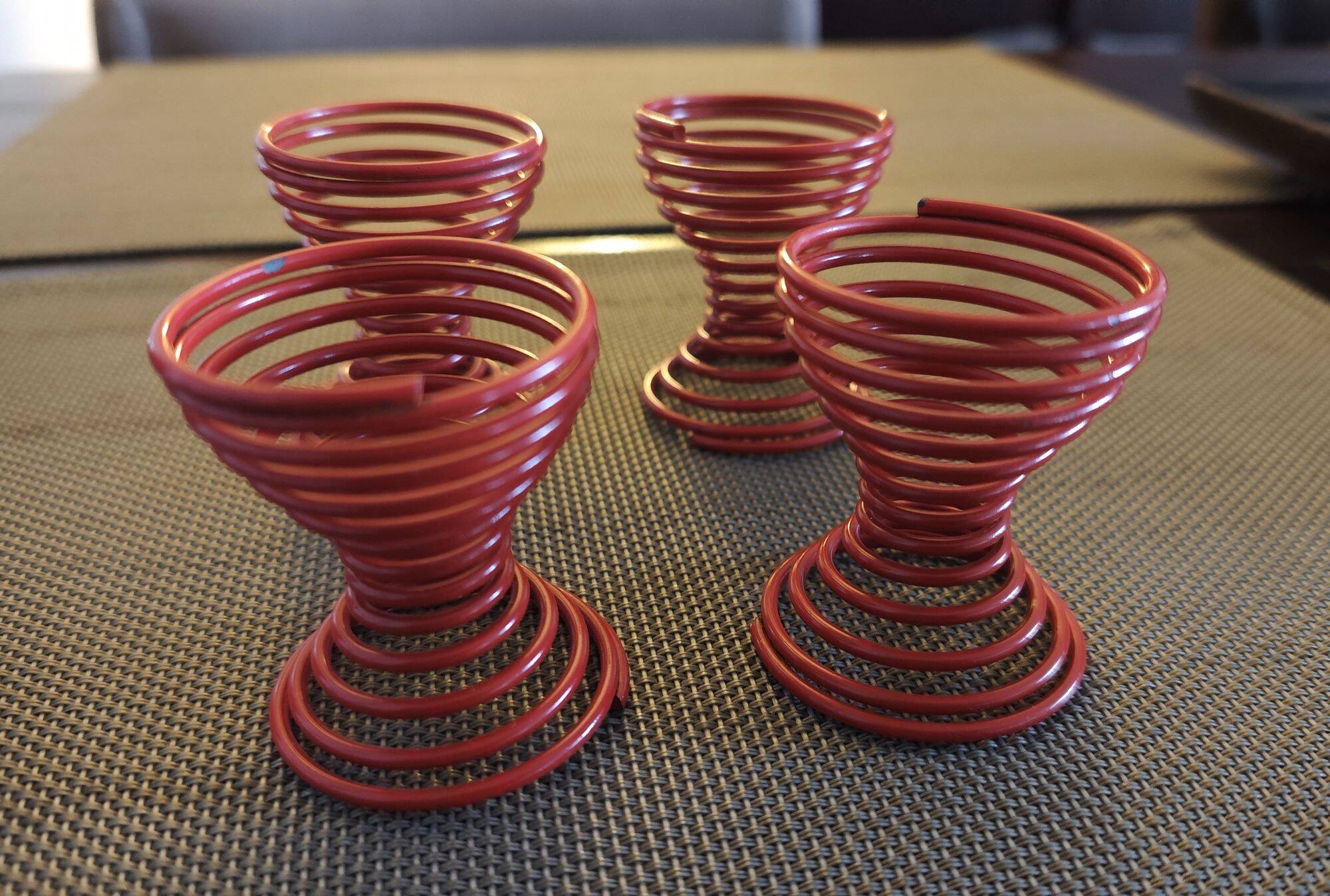 Set of 4 red lacquered spring egg cups - 1980s