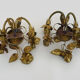 Pair of gilded metal sconces decorated with flowers and foliage. Year 60