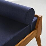 Wooden bench with midnight blue fabric, France, circa 1955