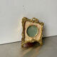 Metal gold colored picture frame brass