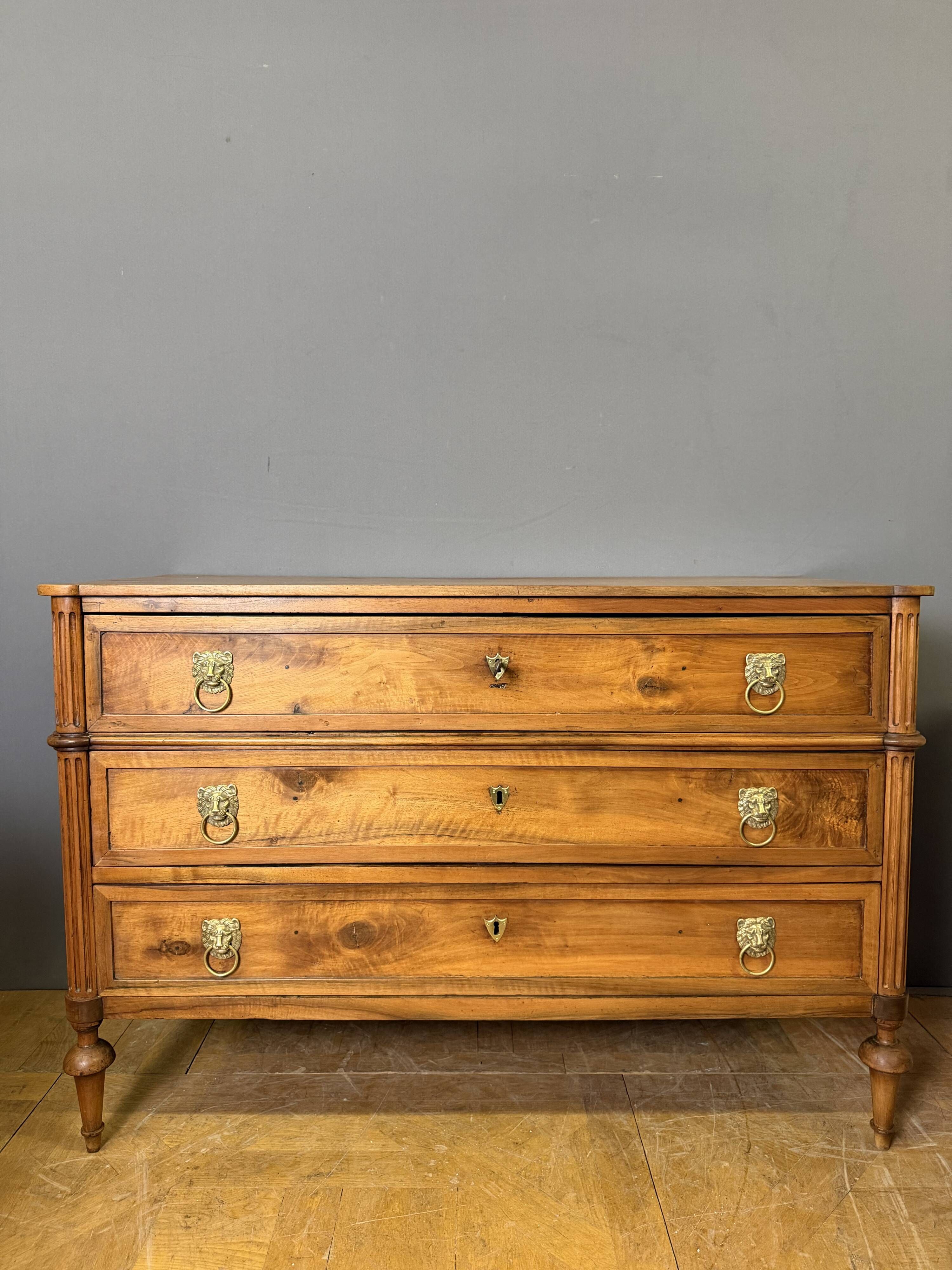 Louis XVI period commode in light walnut.
