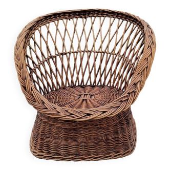 Old throne basket armchair in woven wicker