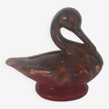 Old piggy bank to break in the shape of a swan