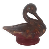 Old piggy bank to break in the shape of a swan