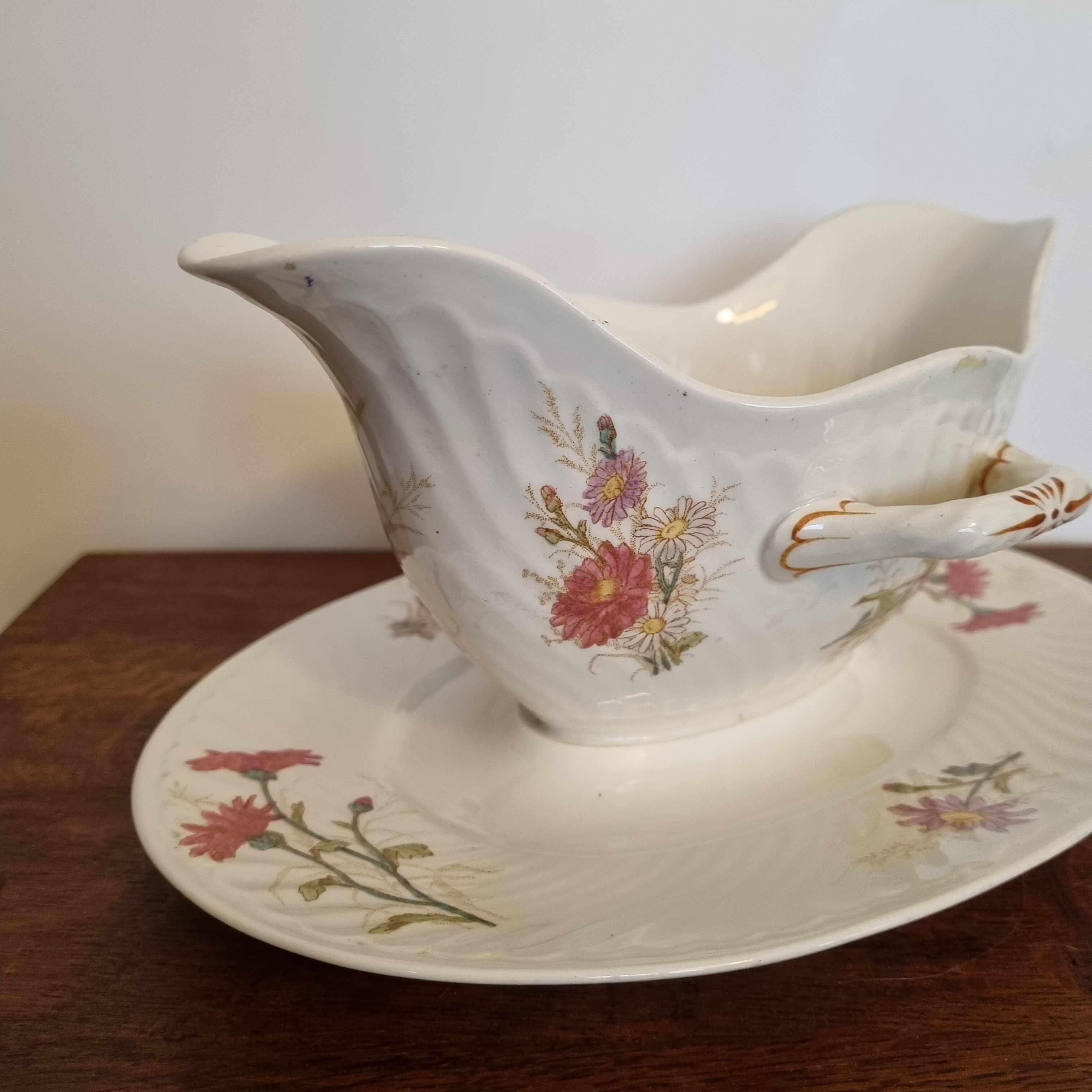 Old earthenware sauce boat from Lunéville