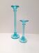 Paire de bougeoirs en verre bleu turquoise