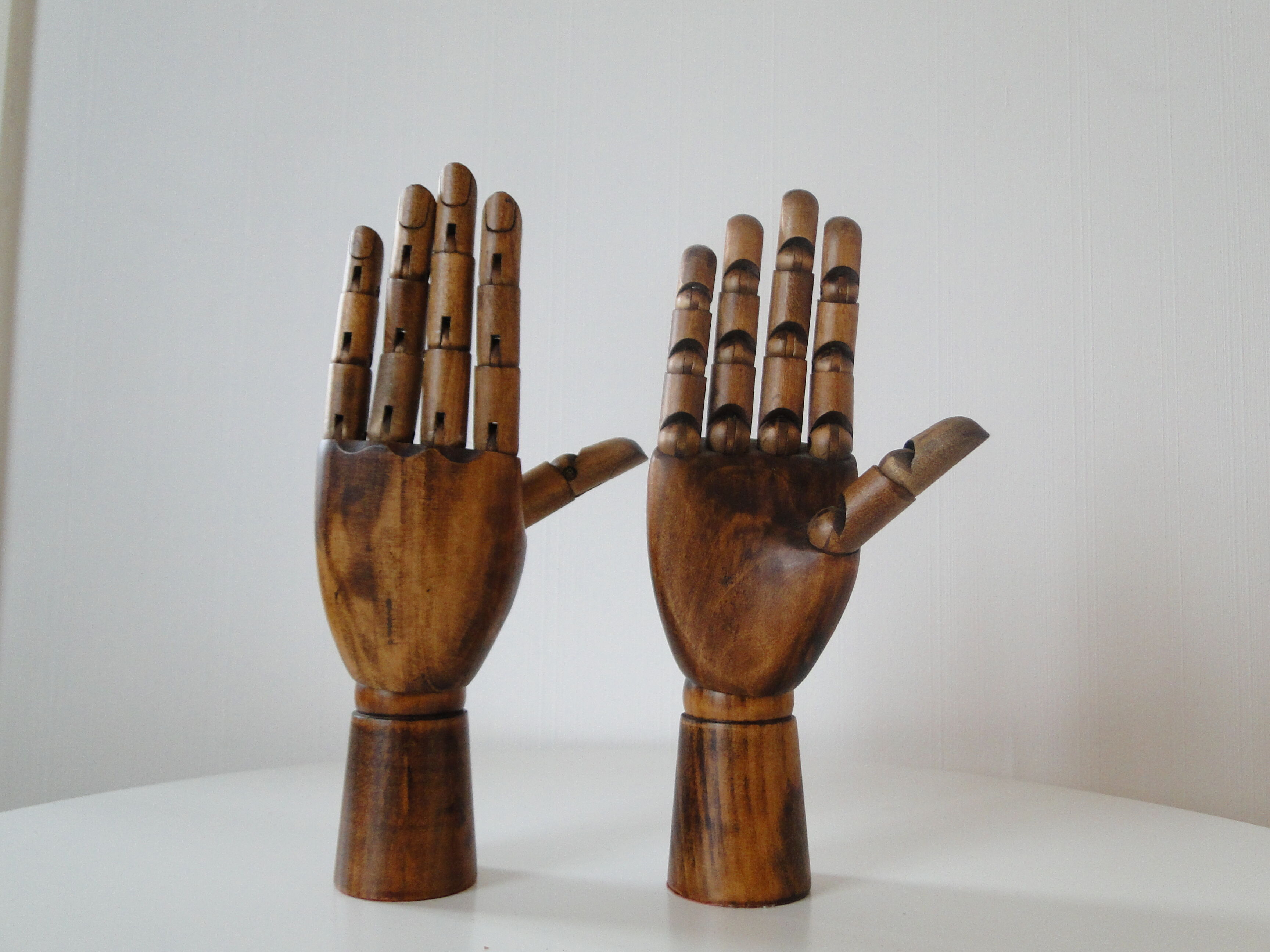 Pair of articulated wooden hands
