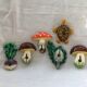 Lot of slurry hooks in the shape of plants and animals