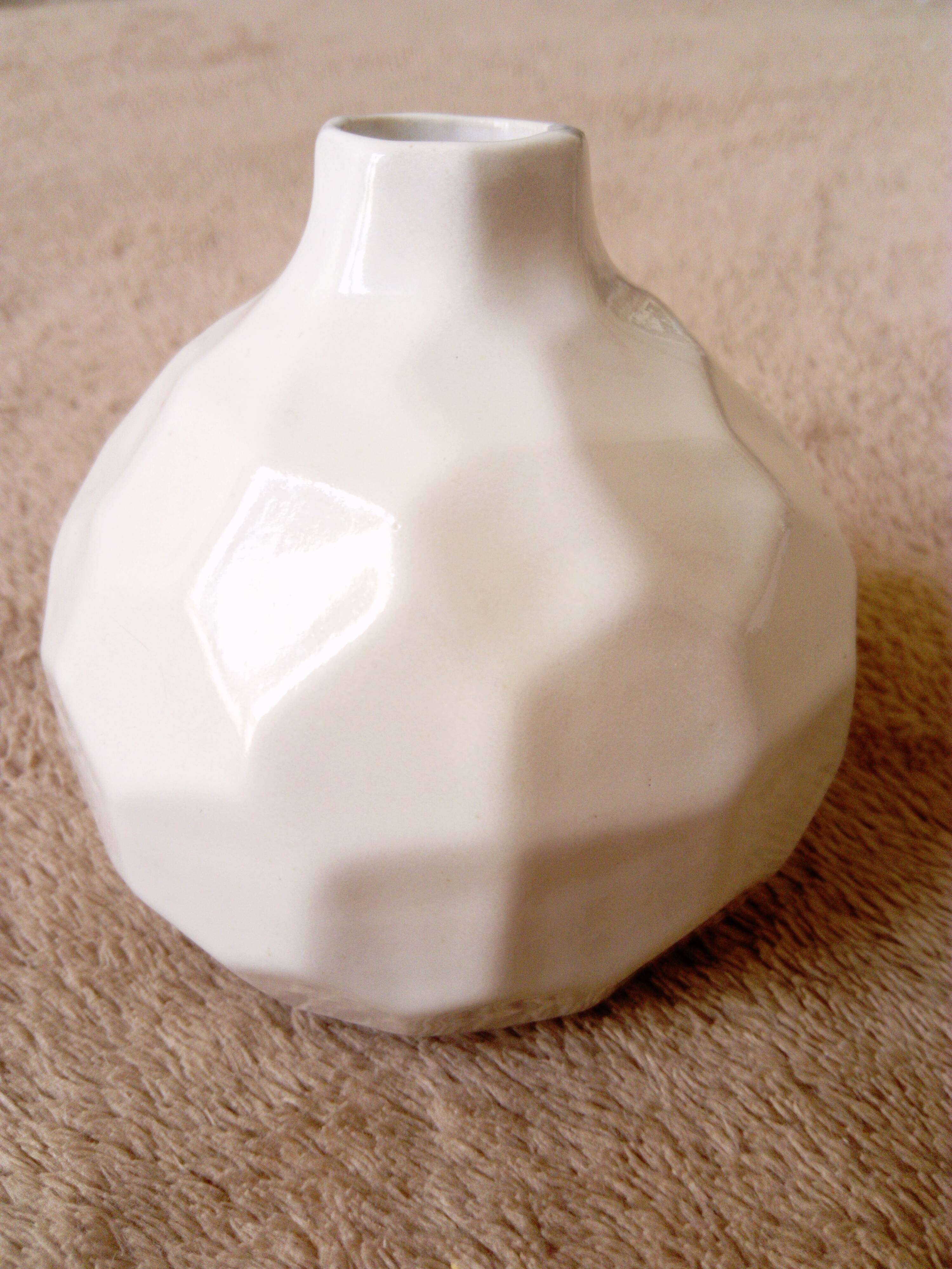 white ceramic faceted design vase