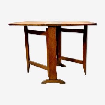 Table pliante en bois début XXème