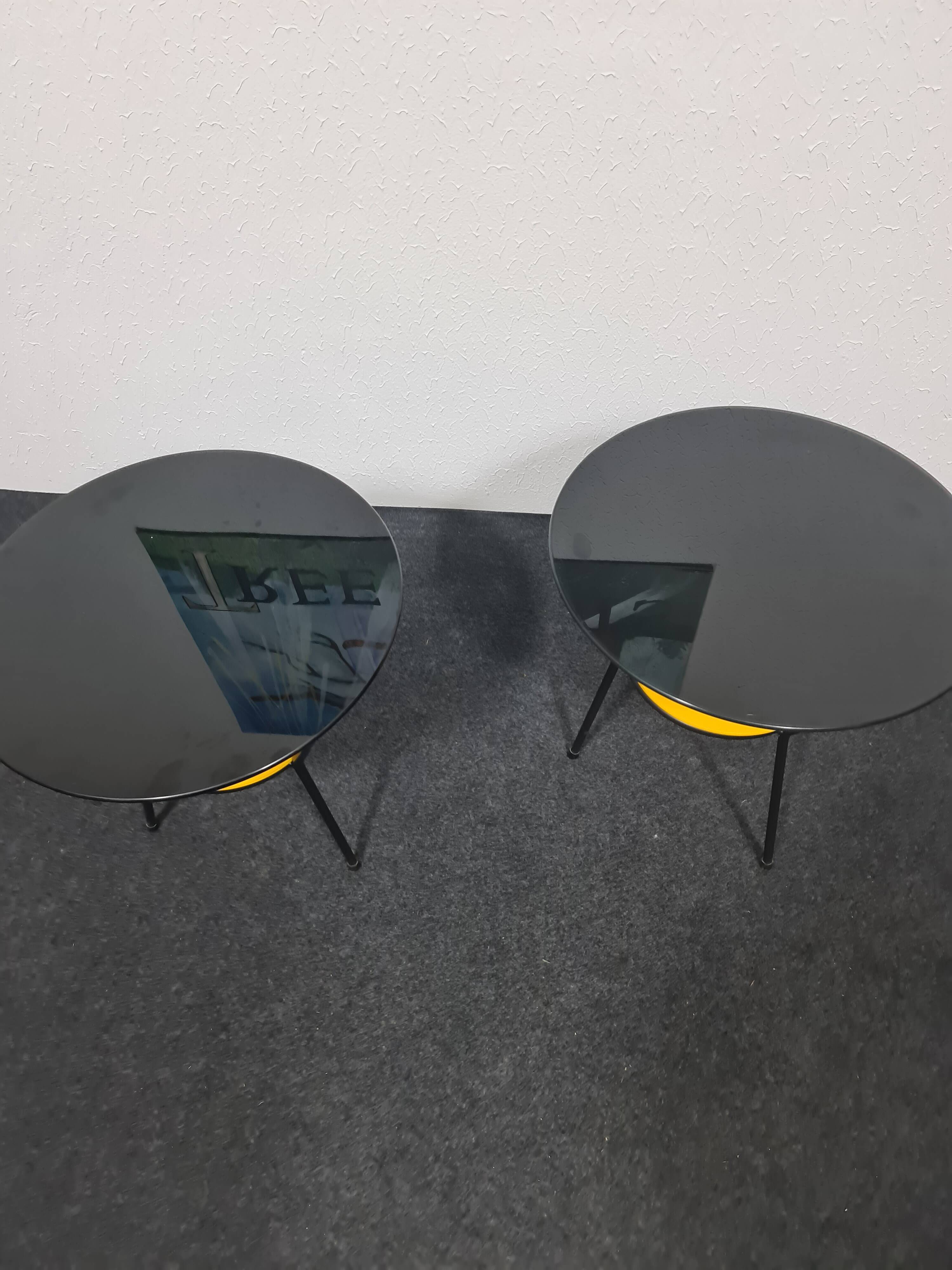 Pair of vintage glass topped side tables