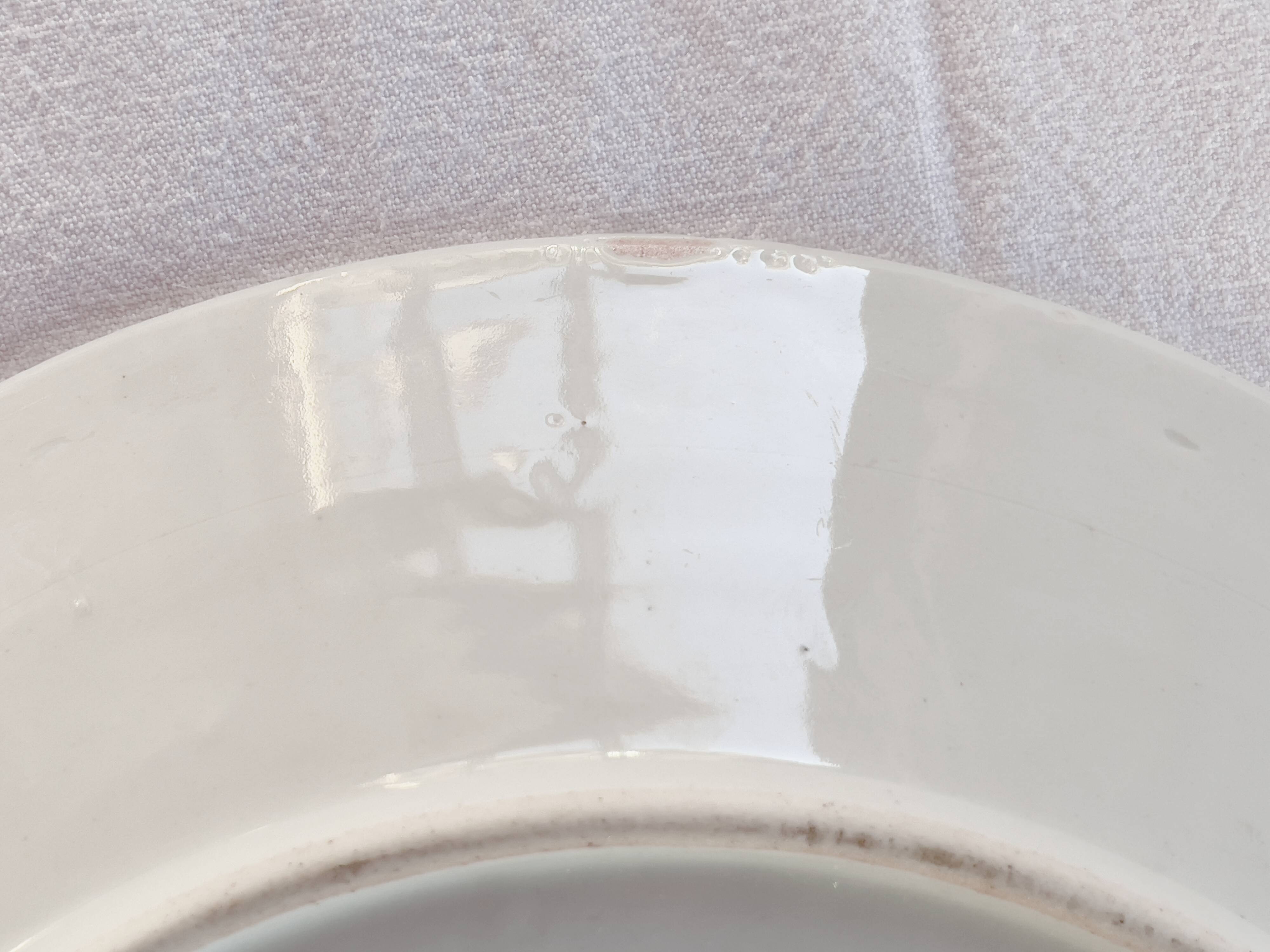 Yellow porcelain plate with saturated and vivid colors. Handmade in Japan