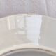 Yellow porcelain plate with saturated and vivid colors. Handmade in Japan