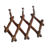 Accordion coat rack many pateres