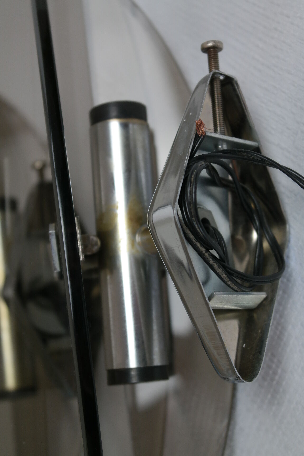 Pair of smoked glass and vintage chrome wall lamps