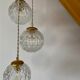 Suspension cascade three lights vintage globes in molded glass