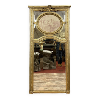 monumental Louis XVI style trumeau mirror in gilded wood