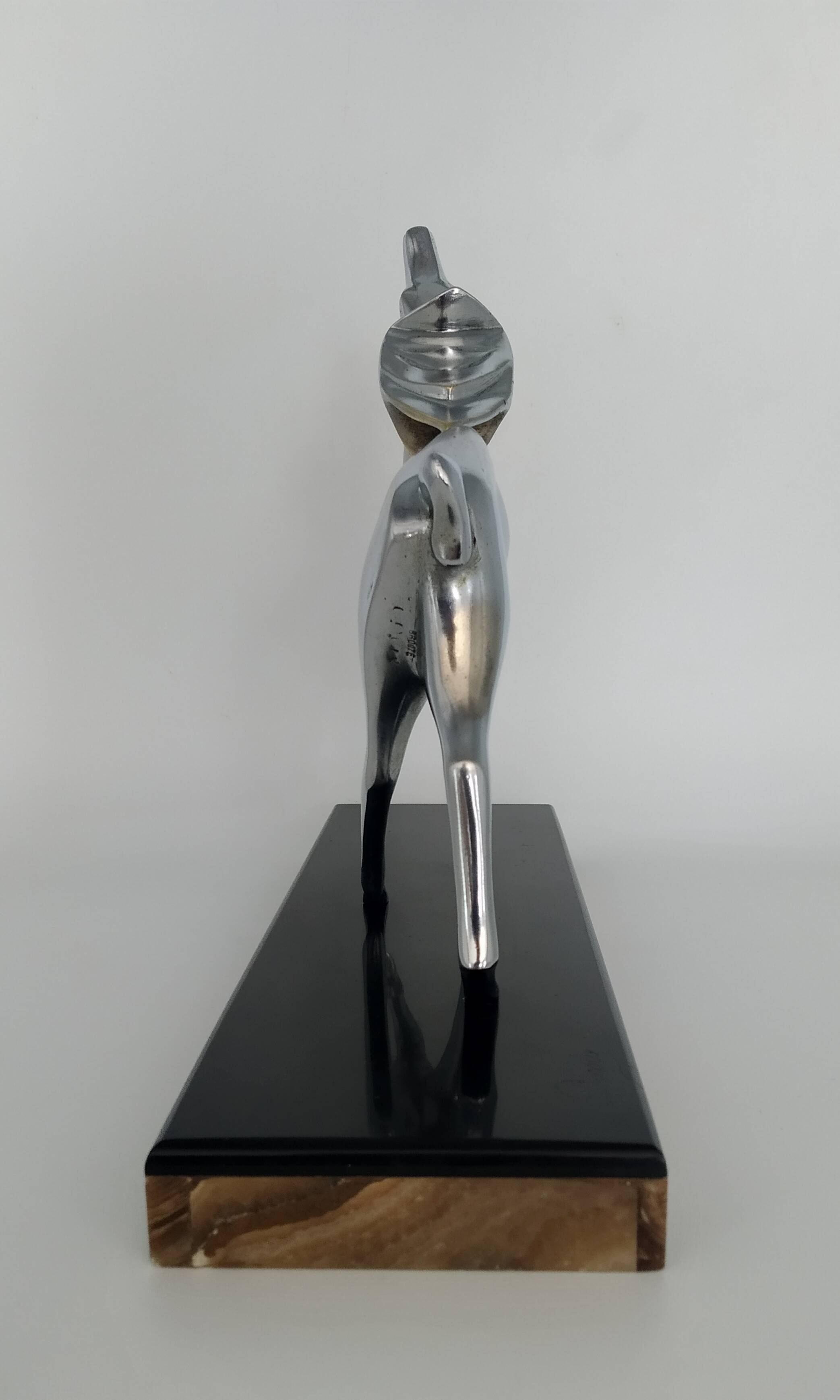 Silvered bronze sculpture signed by Michel Decoux.
