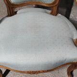 Reupholstered Louis XV convertible armchairs