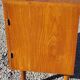 Vintage golden oak sideboard with conical legs from the 1950s