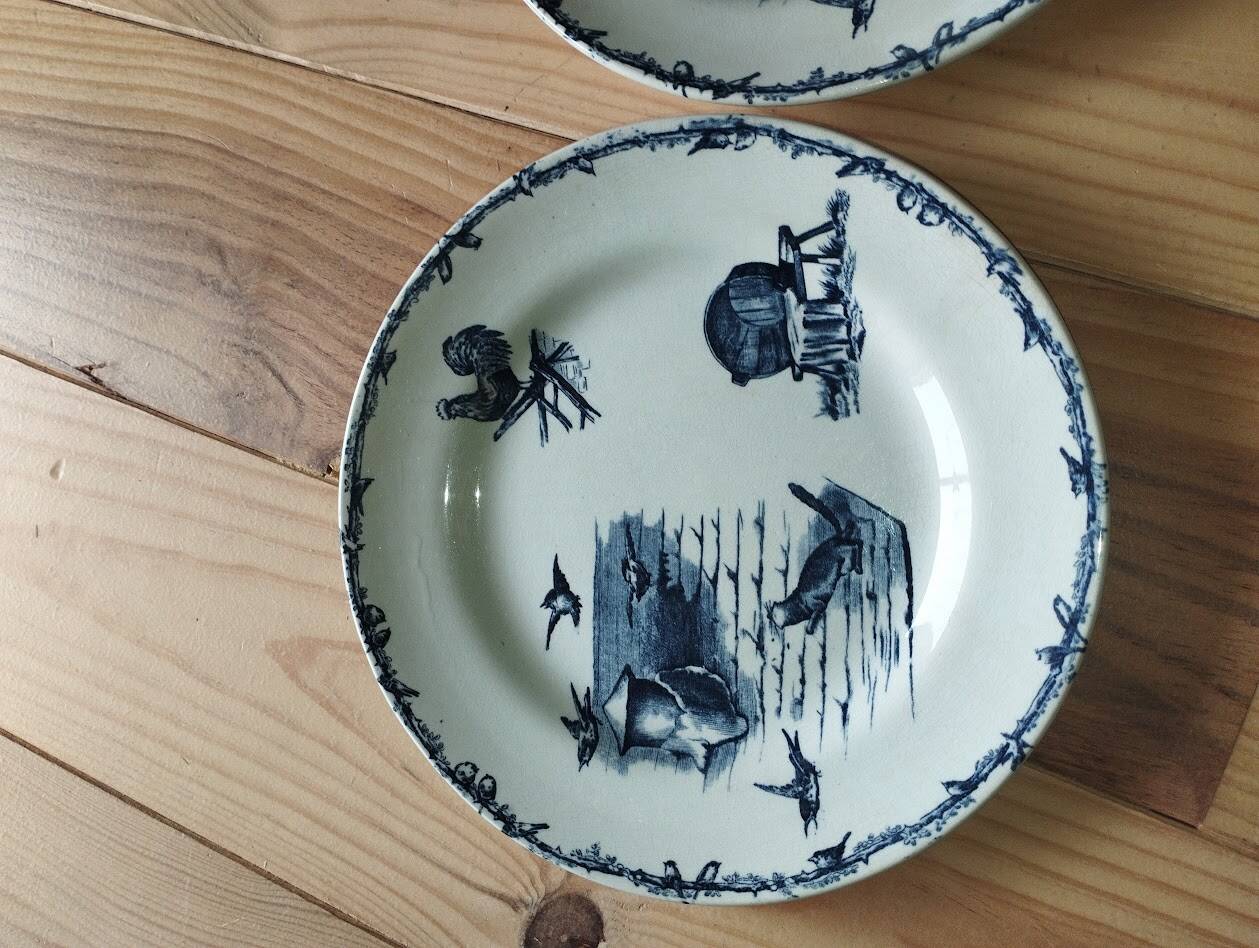 Assiettes Terre de Fer – Décor pastoral bleu – XIXe