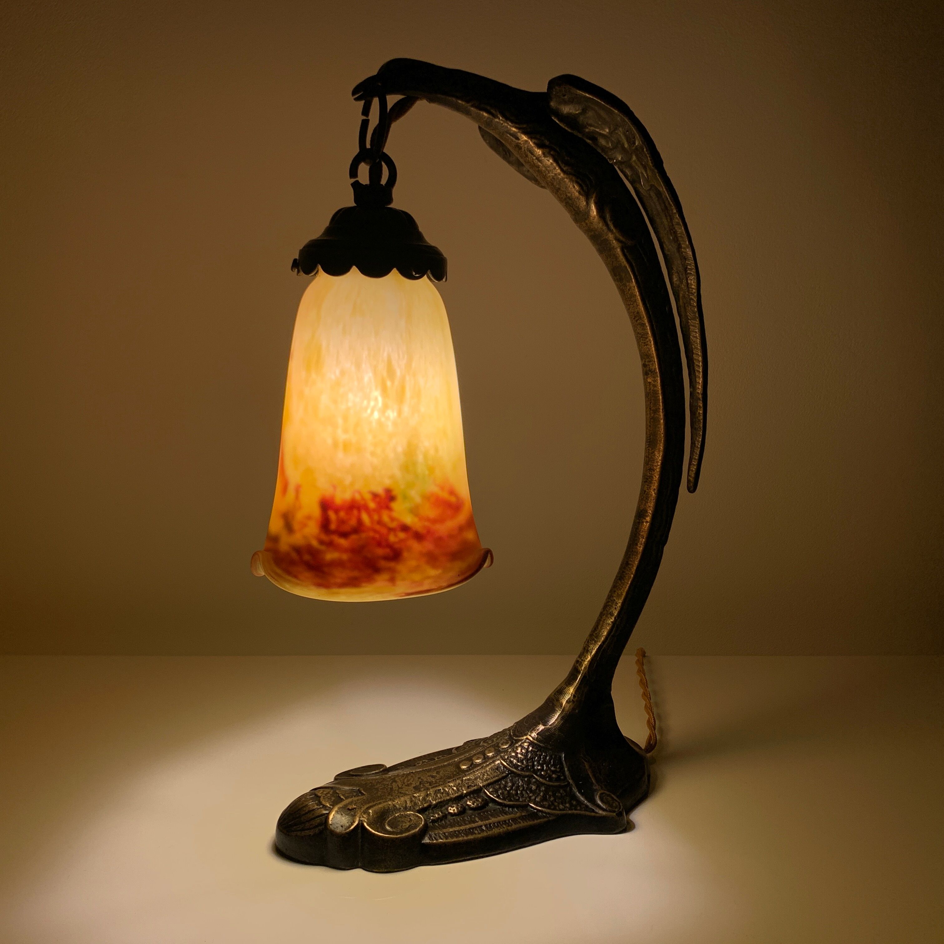 Bronze eagle lamp patinated and Art Nouveau style glass pate