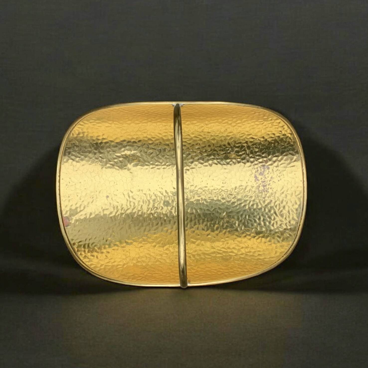 Vintage hammered brass log holder