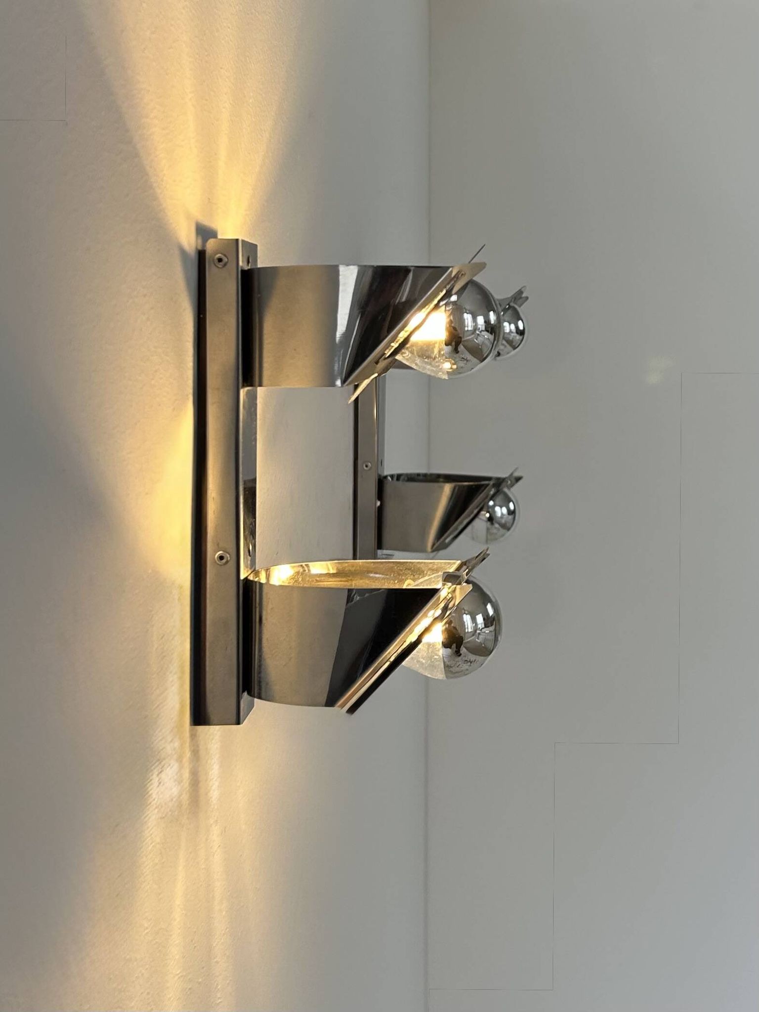 Pair of vintage wall lights, chrome metal, France, 1970.