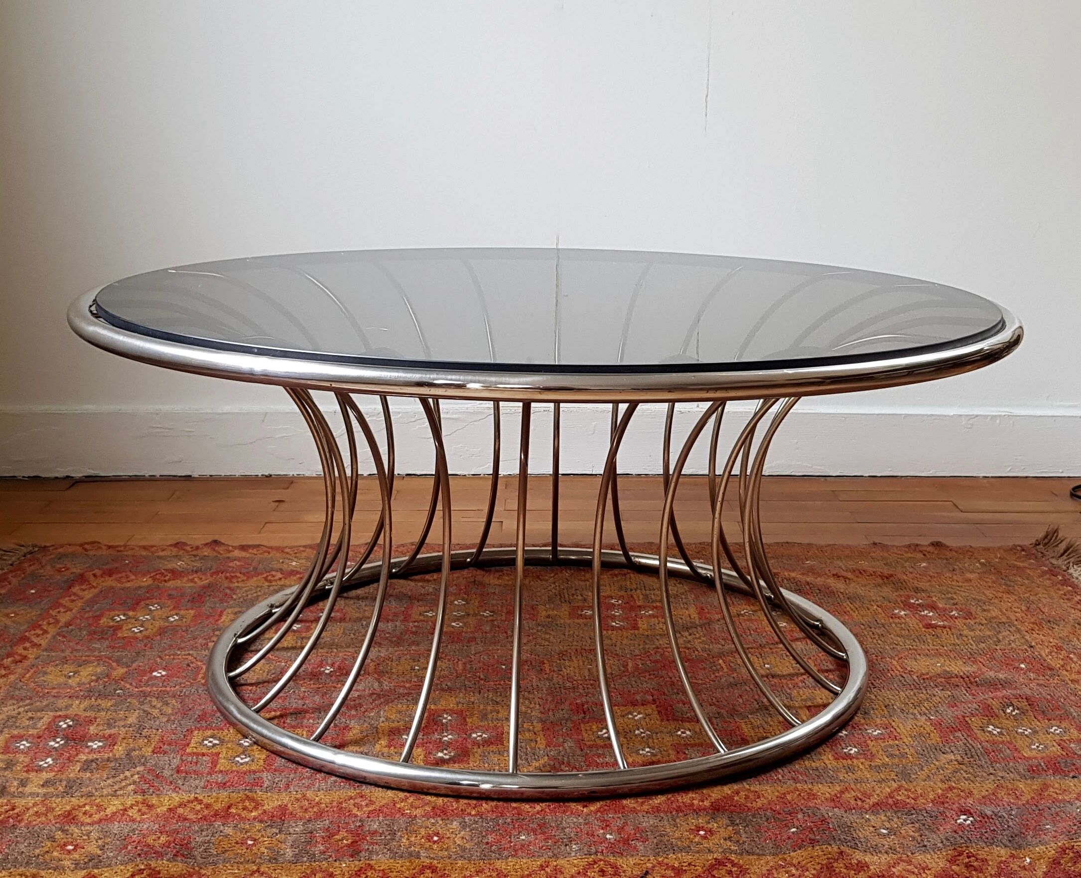 Chromium round coffee table and smoked glass