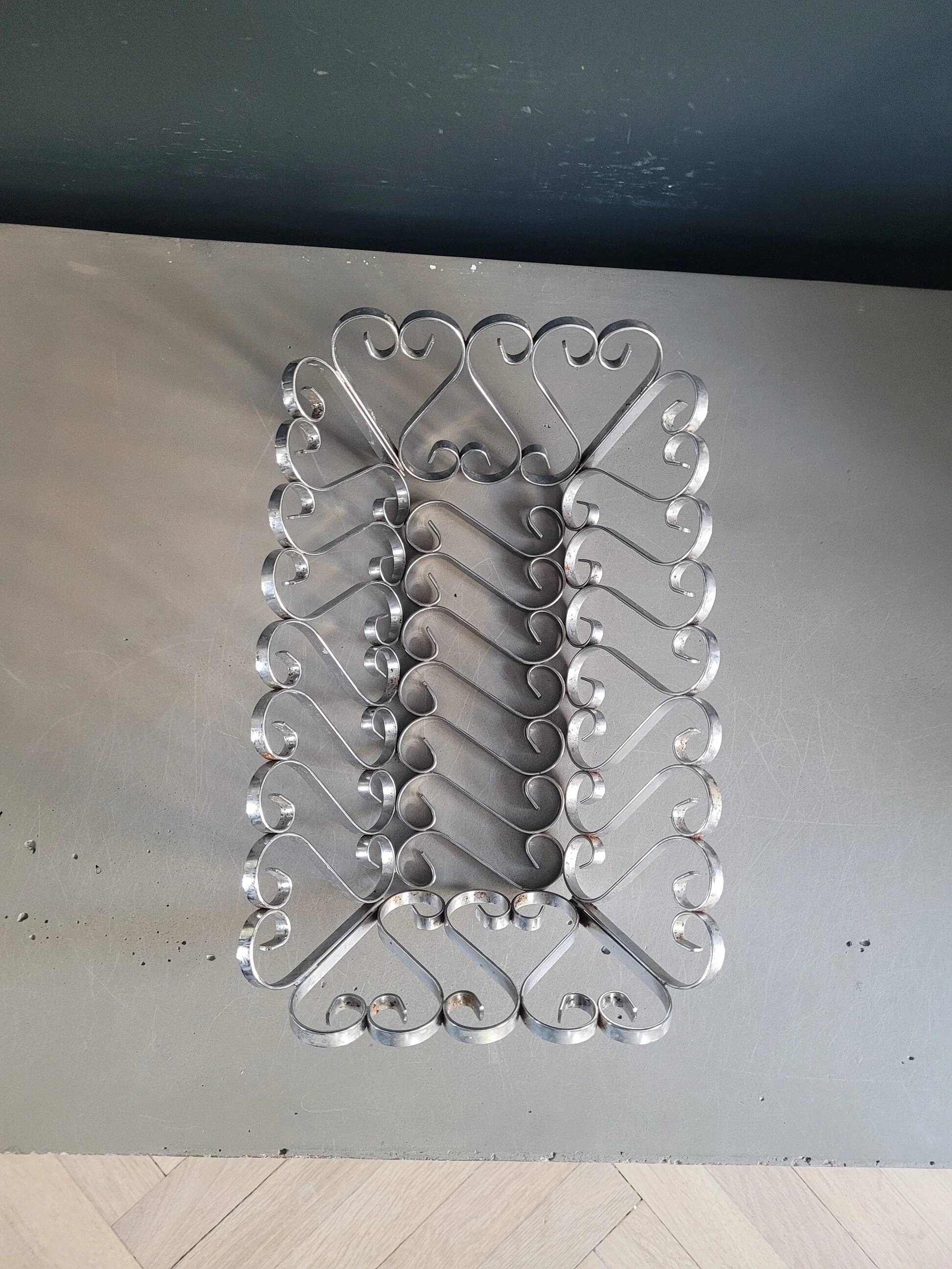 Vintage bread basket in forged chrome-plated metal