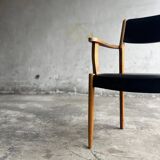 Set of 2 vintage beech wood armchairs with black skai upholstery — mid-century modern