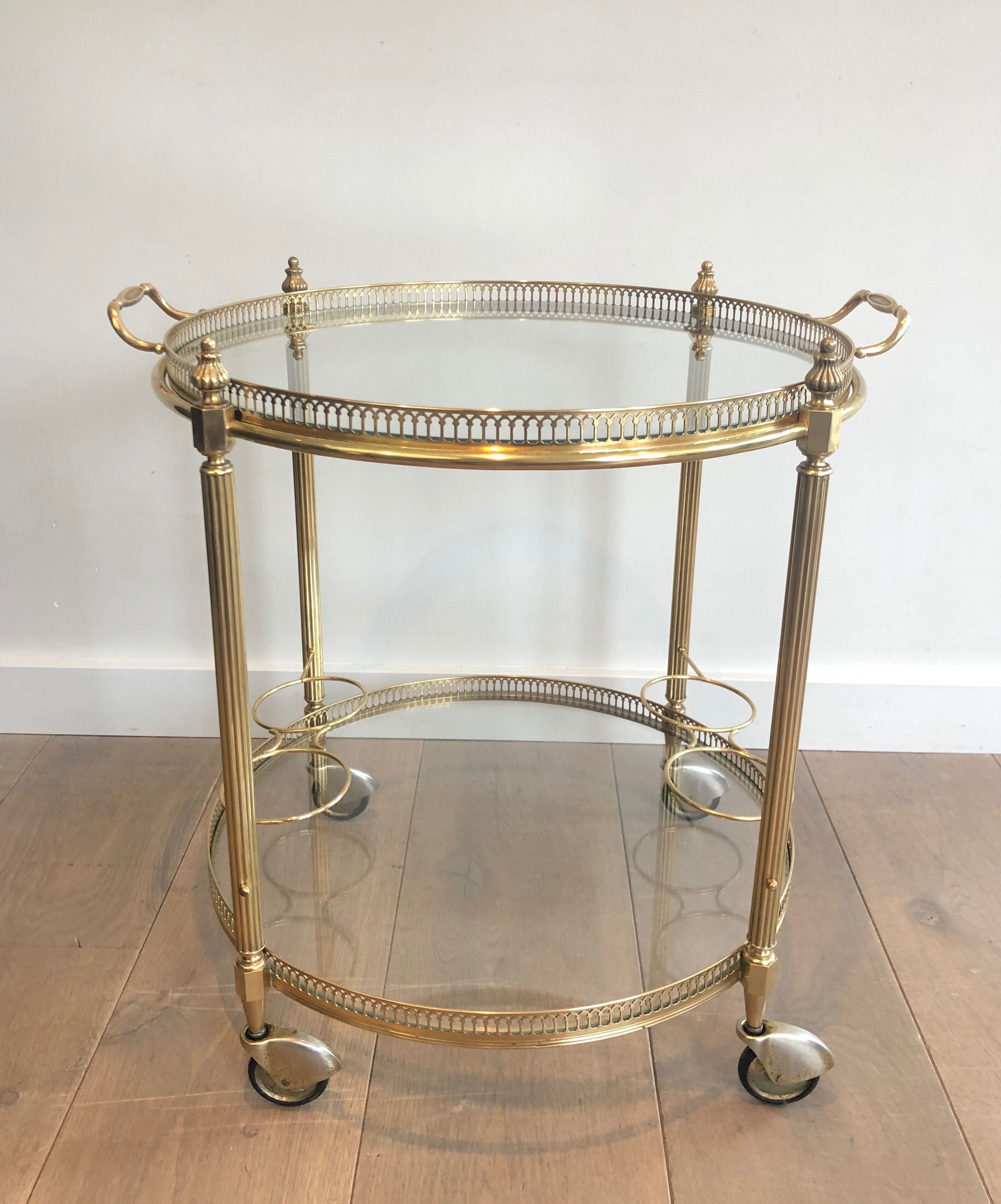 Neoclassical style rolling table in brass