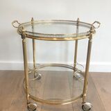 Neoclassical style rolling table in brass