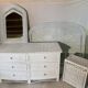 White rattan bedroom set: chest of drawers, mirror, bed, basket