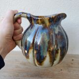 Ceramic pitcher in the shape of a coloquinte melo.