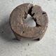 Small low circular four-legged stool in organic old teak with cut-out design H2